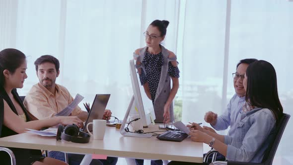 Senior Leader Giving Advice Speech to Team Members alt