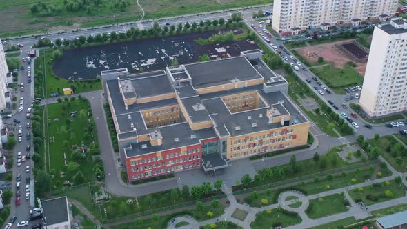 the Modern School is Deserted During Summer Vacations in the Modern Neighborhood alt