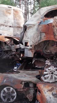 Vertical Video of the War in Ukraine  Destroyed Cars alt