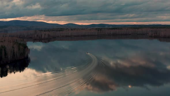 Aerial View of a Motor Boat Sailing on the Lake alt