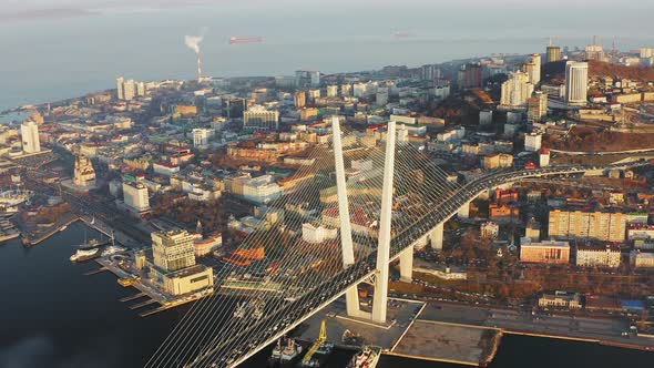 Beautiful Autumn Top View of Cablestayed Bridge with Hills at Sunrise alt