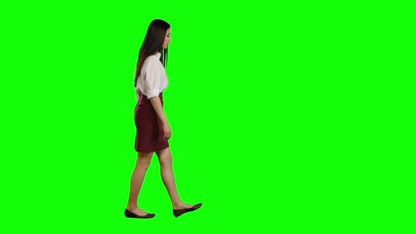 Girl Goes To Work and Waves Her Hand. Green Screen. Side View alt