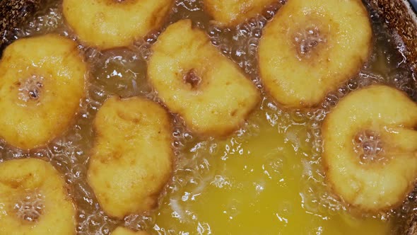 Frying Cooking Homemade Doughnuts on Hot Boiling Oil Fat Junk Food Preparation alt