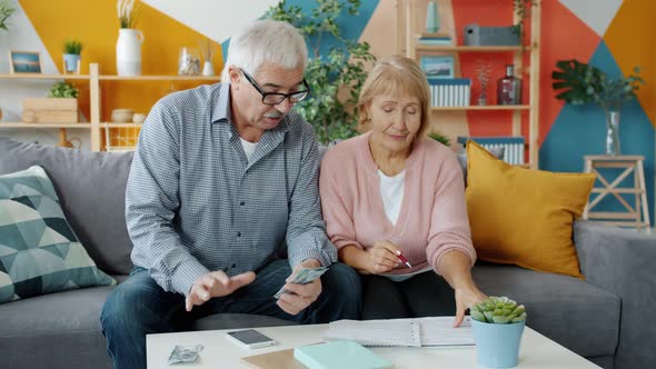 Happy Family Paying Bills Counting Money Then Doing High-five and ...