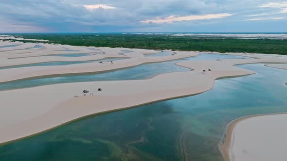 H264drone Flies Over Dunes And Crystal Clear Water Lagoons. Tropical Forest In The Background