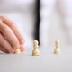 Hand Of A Businessman Positioning Chess Pawn Pieces In To A Pyramid Structure - VideoHive Item for Sale