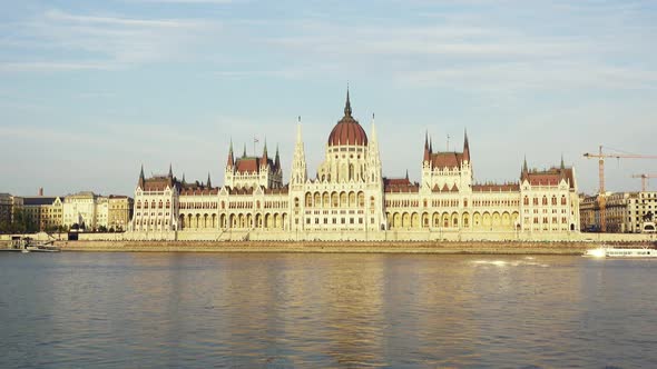 Parliament Building in the Evening at the Danube River in Budapest, Hungary