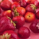 Splashes of water fall on strawberries. Slow motion. - VideoHive Item for Sale