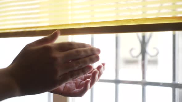 Close up of man hands clapping from his window, claps for healthcare workers alt