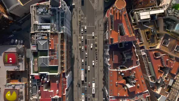 Top down view of cars traveling along street in Madrid Spain alt