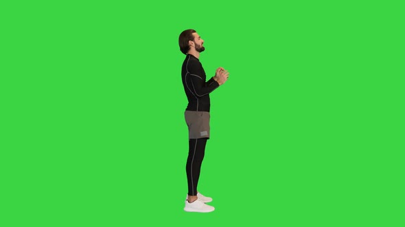 Male Volleyball Player Bouncing a Ball on a Green Screen Chroma Key alt