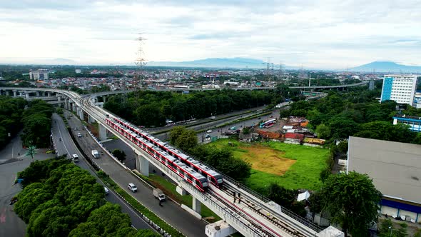 Aerial view of Jakarta LRT train trial run for phase 1 from UKI Cawang alt