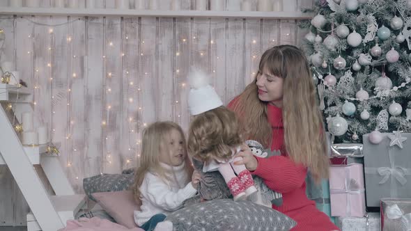 Adored Little Girl Plays Dolls with Pretty Blonde Mother alt