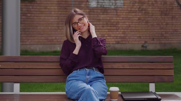 Business Woman talking on mobile phone alt