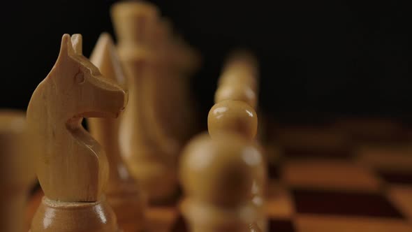 Macro View of White Wooden Chess on Checkerboard alt