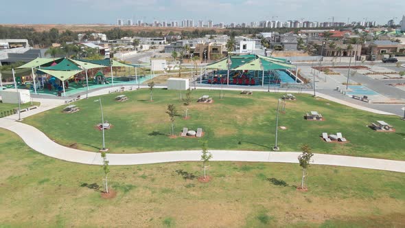 children's playground at the noon, shot from above ,at southern district city in israel named by net alt