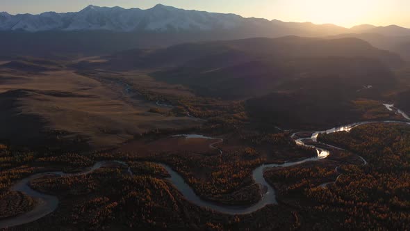 Kurai Steppe, Chuya River and Mountains at Sunset in Autumn. Altai, Russia alt