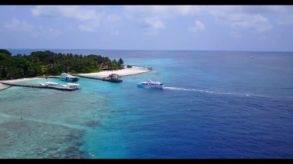 Aerial nature of idyllic bay beach vacation by blue green lagoon with white sandy background of a da alt
