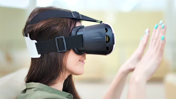 Closeup Head of Astonished Young Woman Wearing Virtual Reality Glasses Playing in Vr Game alt