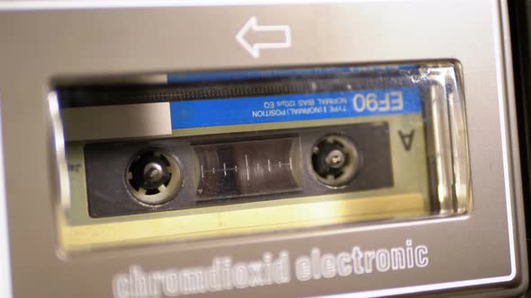 Insert an Audio Cassette Into a Tape Player and Playback alt