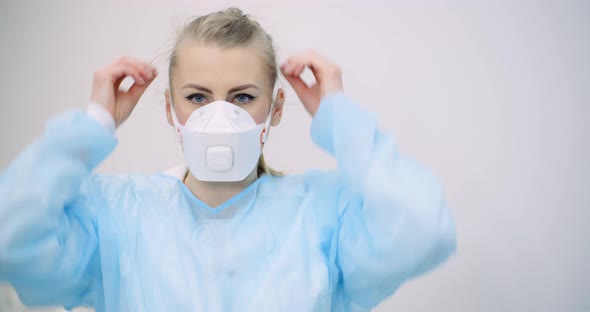 Portrait of Doctor Wearing Protective Mask in Hospital. Covid-19 Coronavirus alt