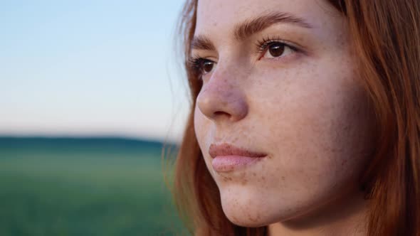 Attractive Pensive Girl Having Brown Eyes Standing in the Field Outdoor alt