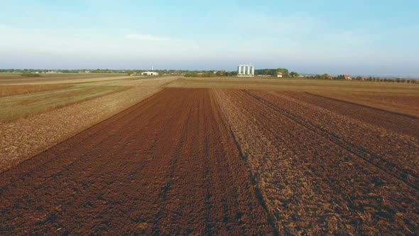 Harvester On A Farm Field alt