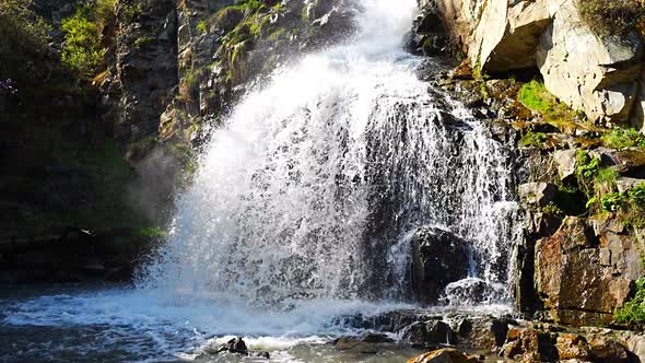 Kamysh Waterfall at Sunset Light Spring Time in the Altai Republic Siberia Russia alt