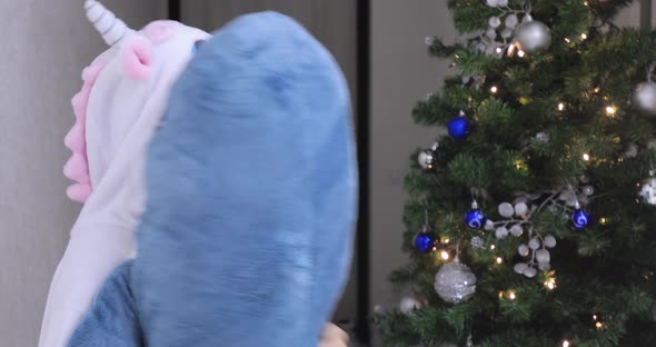 Baby Girl and Blue Toy Shark alt