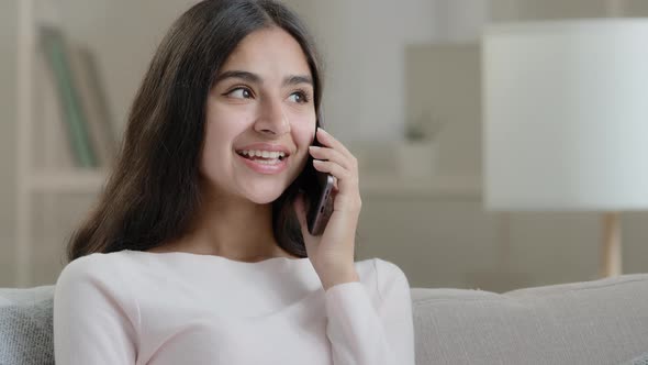 Hispanic Lady Has Mobile Conversation Friendly Chatter at Home Cellular Chatting Talking with Friend alt