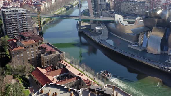 Drone view of Bilbao; beautiful cityscape of Basque country capital in sunny winter day alt