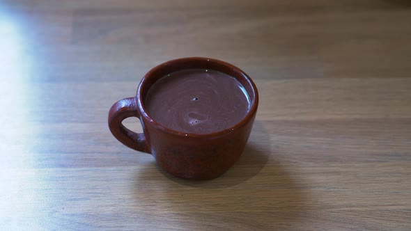 Ultimate luxury gourmet home-made hot chocolate in artisan mug, closeup
