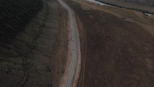 Traffic cars on Chuya highway alt