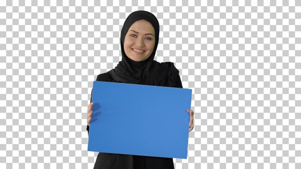 Smiling Arab woman in hijab holding blank, Alpha Channel alt
