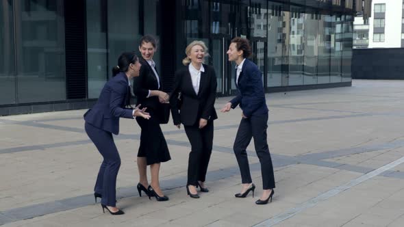 Four Happy Businesswomen Win Tender Celebrating Success High Five Gesture. Successful Business