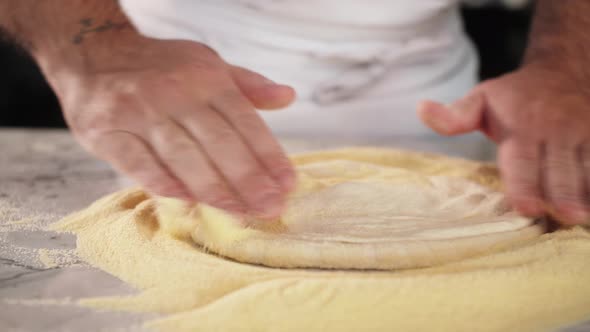 Italian Chef Making Dough for Pizza Traditional Food Man Working in Restaurant Kitchen High Cuisine alt
