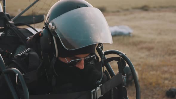 Client Adjusting Safety Gear and Equipment Before Start alt