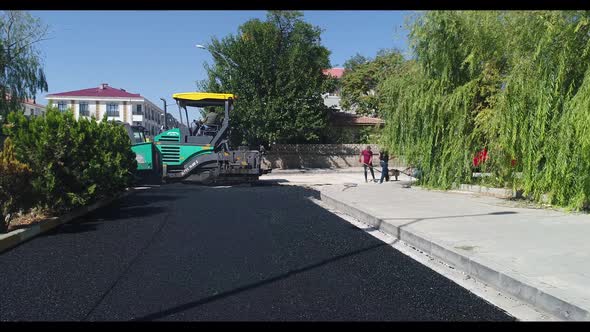 Road Rollers Building the New Asphalt Road.