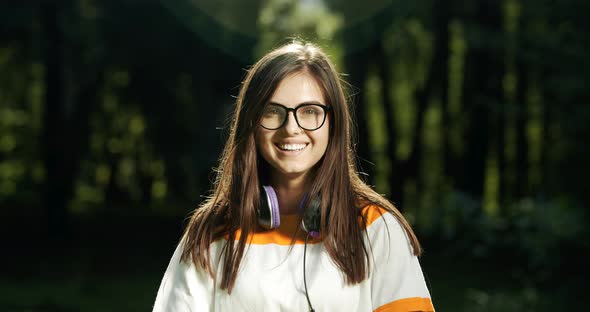 Portrait of Happy Woman in Park