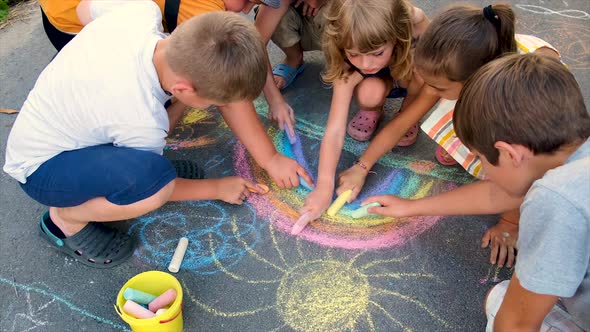 The Child Draws a Rainbow with Chalk, Stock Footage | VideoHive