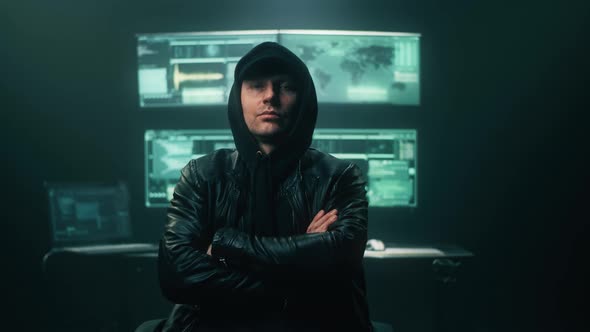 Serious Hacker Looking at the Camera alt