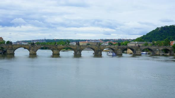 Wide view of Charles Bridge in Prague, Czech Republic over the Vltava River alt