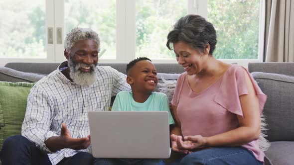 Grandparents and grandson spending time together alt