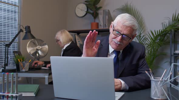 Business Man Using Laptop Internet Online Meeting Conference in Office Webinar Talking on Webcam alt