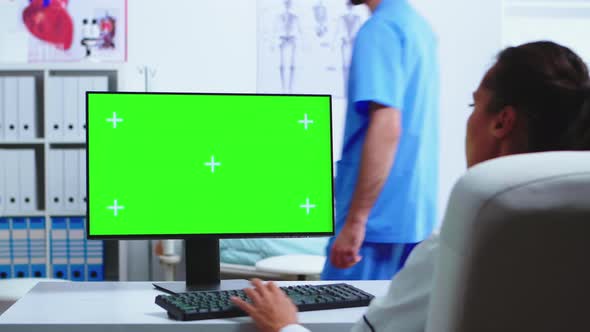 Doctor Working On Computer With Green Screen By Dc Studio Videohive