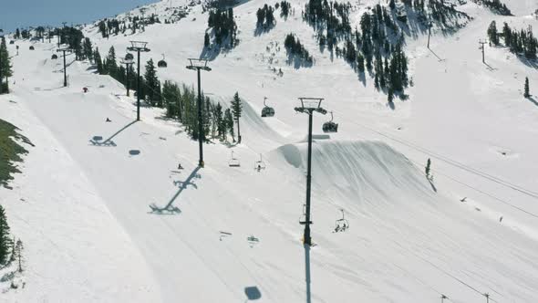Aerial View on Ski Chairs at the Mammoth Mountain Resort on Sunny Winter Day USA alt