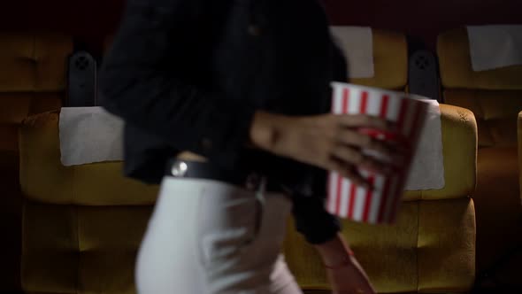 Man and Woman Walk to Sit on the Chair alt