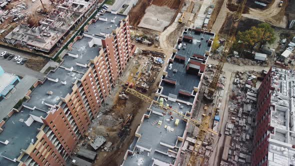 Aerial view of rows of buildings under construction.