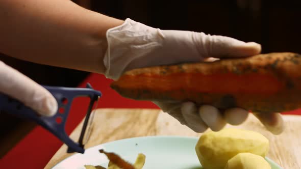The Cook Peels the Carrot in Very Pleasant Atmosphere alt