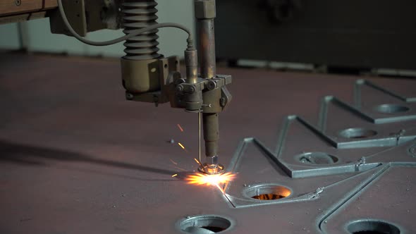Plasma Cutting of Metal on an Automatic Laser Machine alt
